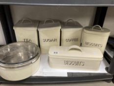 Six items of cream Kitchen tin canisters Tea, Coffee, Sugar, Biscuits x 2 and cake(6)