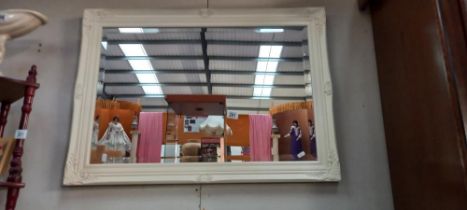 A large bevel edge mirror with painted frame (88cm x 63cm) COLLECT ONLY