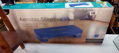 A boxed aerobic stepper COLLECT ONLY