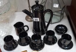 A vintage pottery coffee set