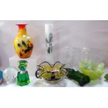 A selection of vintage coloured art glass including scene bottle vases etc