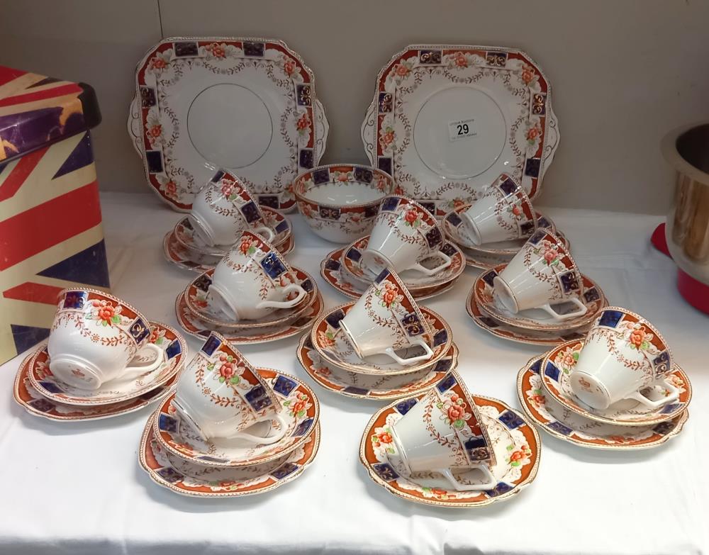A 1930s Bone China trio's cups & Saucers with cake plates