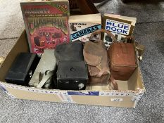 A quantity of vintage cameras & Guide books