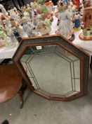 An octagonal mirror with leaded detail