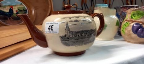 A 1930's teapot with scenes of Ropsley. Christmas gift from A.F Rowell grocer & draper