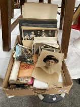 A quantity of black & white photos etc