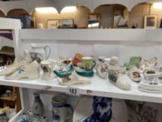 A collection of crested china mostly shoes