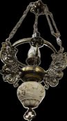 An electric brass oil lamp style chandelier with ceramic style base featuring Cherubic children