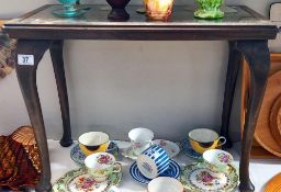 A dark wood side table with carved top under glass COLLECT ONLY