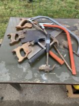 An assortment of bow & hand saws