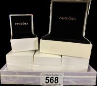 A quantity of 8 empty Pandora boxes