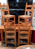 A pine dining table & 4 rush seated chairs COLLECT ONLY