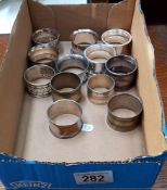 11 Silver plated napkin rings & 1 Silver