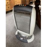 An oscillating electric halogen heater COLLECT ONLY