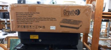 A Gravit8 vibration plate with box