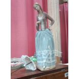 A Lladro lady with parasol figurine (Missing parasol) Approximately 50cm High COLLECT ONLY