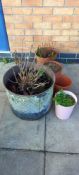 A metal planter & 3 plant pots