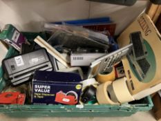 A tray of stationary consumables including A mini shredder, Hole puncher, Stapler etc
