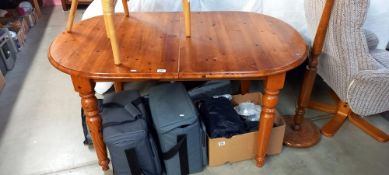 An oval pine kitchen table, COLLECT ONLY