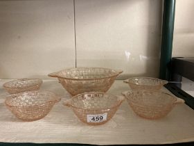 A set of 6 peach coloured vintage glass dishes