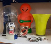 A quantity of miscellaneous gadgets with Handcuffs (With keys)& A jelly baby moneybox