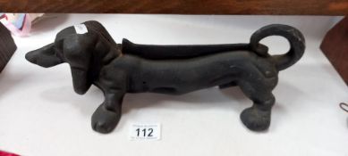 A cast iron Dachshund dog boot scraper