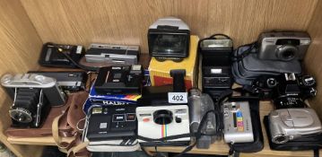 Good selection of instant cameras, a poloroid camera, GB Kershaw 110, a Ricoh KR-10 plus others