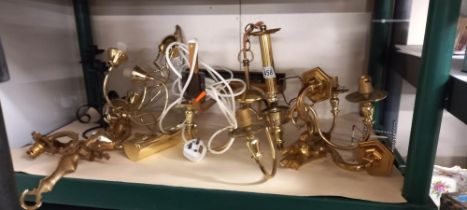 A collection of Light fittings, 2 brass chandeliers, 2 heavy wall sconces & two others plus
