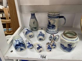 A quantity of blue & white Dutch pottery including clogs