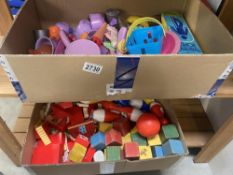 2 boxes including wooden blocks, skittles & childrens tea party items