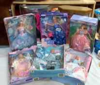 8 Boxed Barbie dolls (1 of which is Ken)