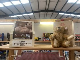 A boxed Steiff Theidine bear QVC exclusive & A boxed Steiff Fynn teddy bear in suitcase