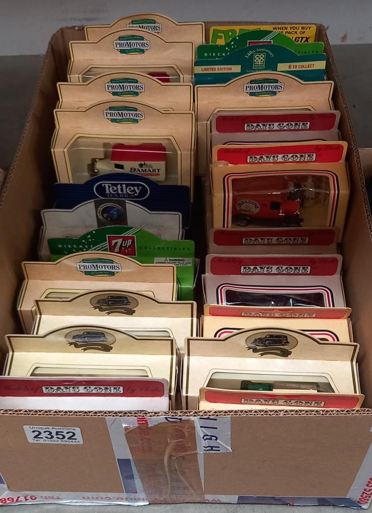A large box of Lledo models