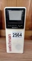 A Vintage Sony FD-28 Watchmen pocket black & white television. Powered up when tested