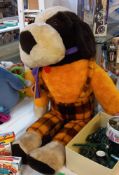 A large 1970s St Bernard soft toy with tartan trousers approximate height 120cm COLLECT ONLY