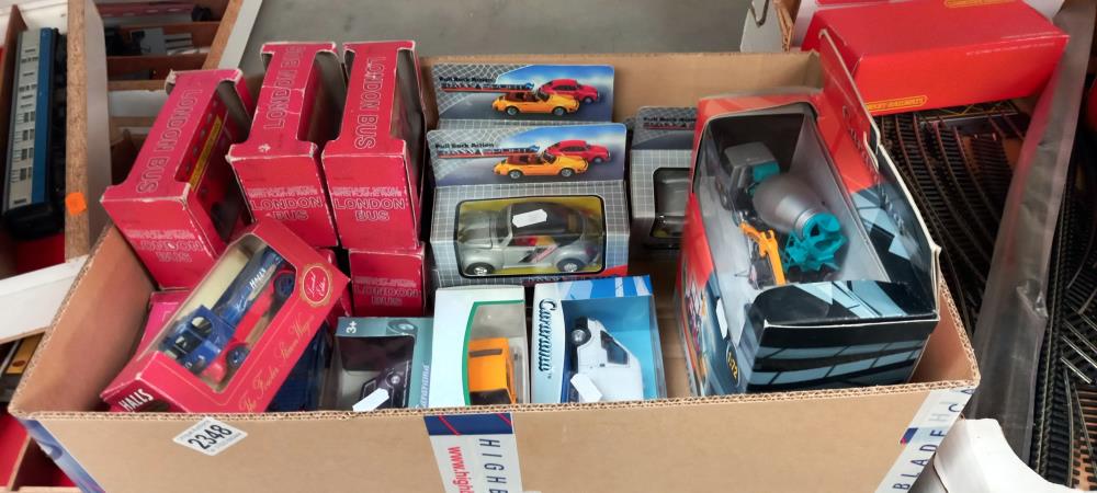 A good selection of mixed boxed diecast including Cararama, Ford Capri etc