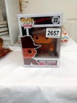 A Freddy Krueger 8 bit pop vinyl (Also in protective outer box)