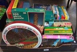 A box of vintage jigsaw puzzles (Completeness unknown)