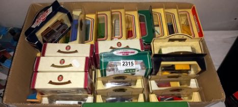 A box of Oxford diecast & Lledo boxed models
