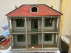 A large vintage wooden dolls house. COLLECT ONLY
