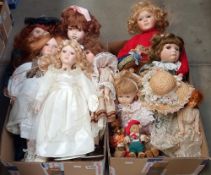A collection of bisque head dolls etc in 2 boxes