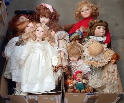 A collection of bisque head dolls etc in 2 boxes