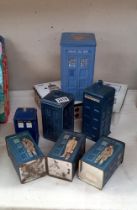 A quantity of Doctor Who Tardis's including tins & pottery money boxes