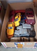 A quantity of large scale die cast model cars, in as found condition