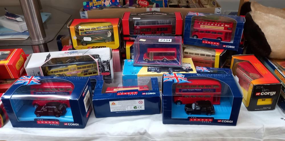 A good lot of boxed Corgi buses including trams