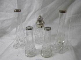 Two pairs of silver topped vases and a silver topped sugar sifter.