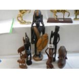 A mixed lot of wooden figures etc.,