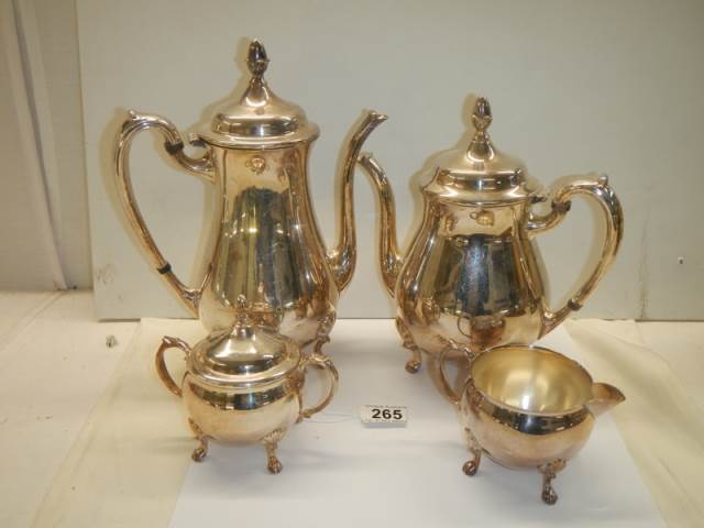 A four piece silver plate tea set.