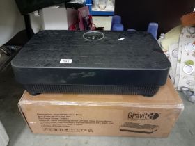 A boxed Gravit8 vibration plate