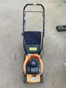A Grassland petrol mower low emission series PM401. Needs attention